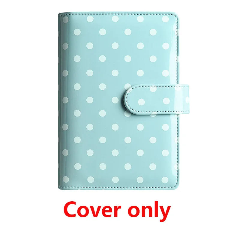 Light blue reusable PU leather binder cover with white polka dots and a clear plastic pocket.