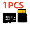 One piece of a black MicroSD memory card with a yellow contact area labeled 16 GB.