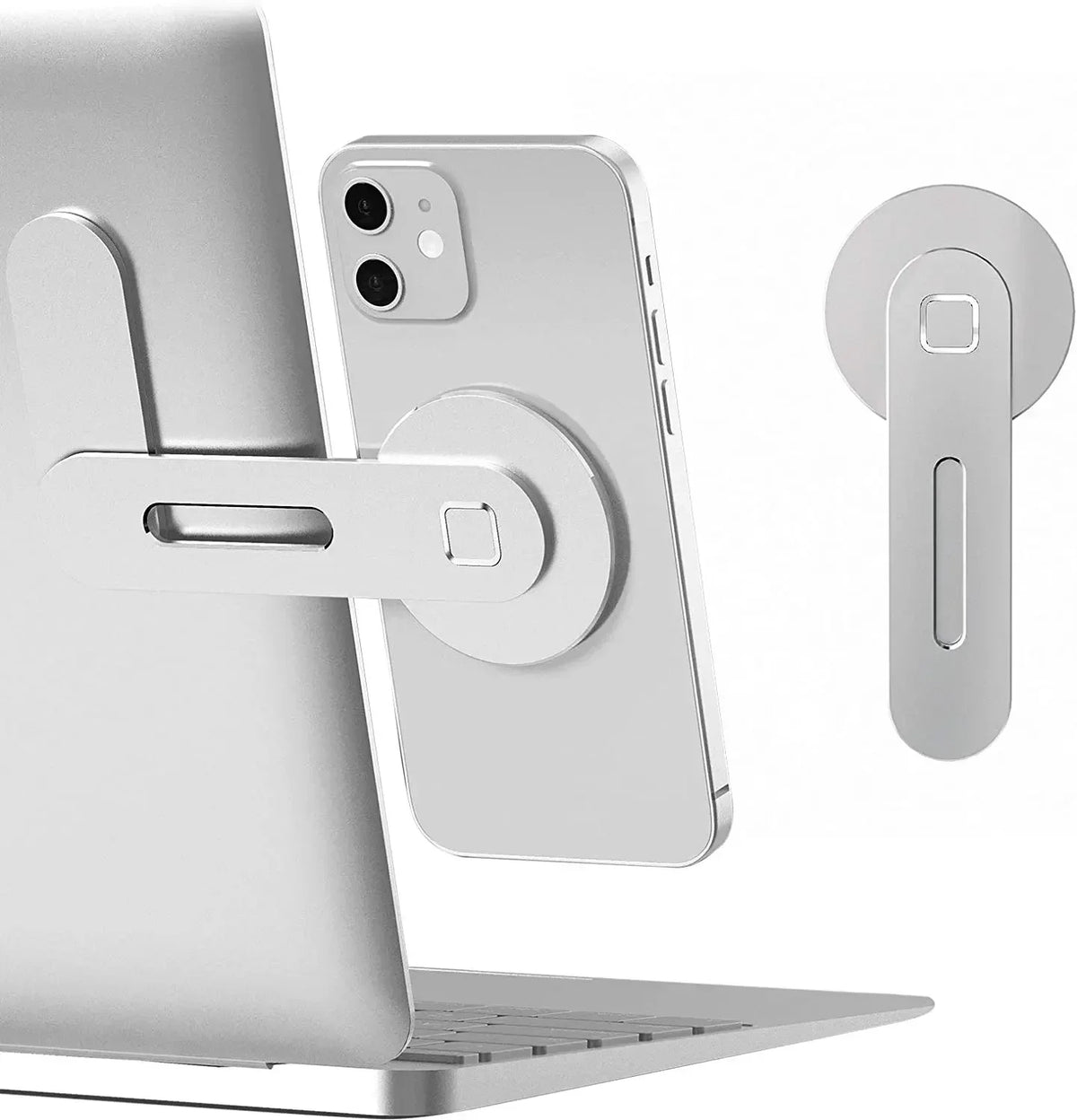 A silver magnetic phone holder is attached to a laptop, with a separate clip shown nearby.