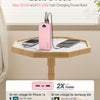 Pink fast charging power bank with QC3.0 and PD3.0 ports shown next to smartphones on a wooden table.