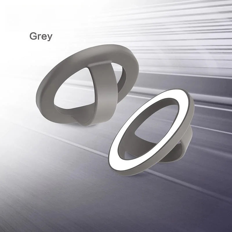 A grey magnetic silicone phone grip with a foldable stand shown in a side view.