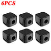 Six black magnetic cable clips designed for desk organization.