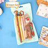 A brown set of 6 cartoon school stationery items including pencils and markers in a light green pouch.