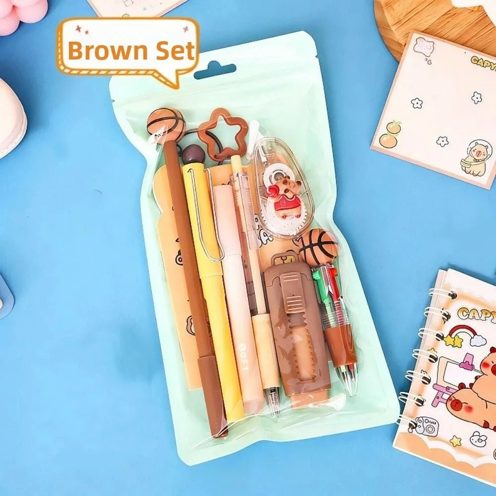 A brown set of 6 cartoon school stationery items including pencils and markers in a light green pouch.