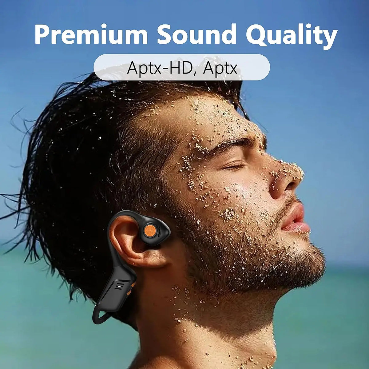 A man is wearing an open-ear Bluetooth headset while outdoors, with powder visible on his face.