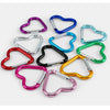 A collection of five colorful heart-shaped spring clasps and carabiner keychains in various colors like purple, blue, silver,