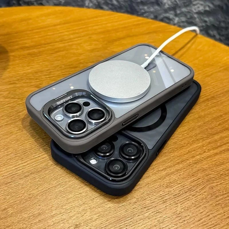 A gray MagSafe compatible phone case with a built-in camera bracket and lens cover resting on a wooden surface.