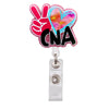 A pink and blue heart shaped badge reel holder with a pink hand gesture and the letters CNA