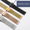 A collection of stainless steel mesh watch bands in various colors and finishes displayed diagonally.