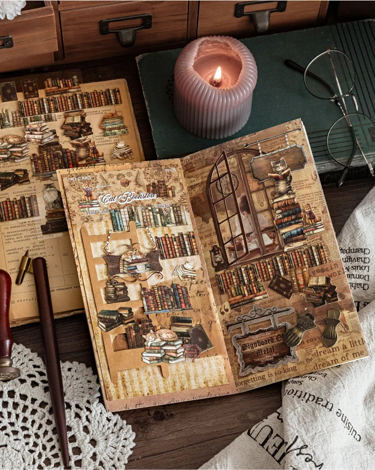 An open vintage book with detailed illustrations and text lies on a wooden surface next to a candle and eyeglasses.