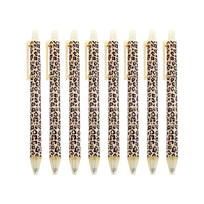 A set of ten leopard print retractable ballpoint pens with black ink.