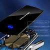 A close-up view of a black wireless car phone mount for an iPhone, showing internal components and a gold-colored coil.