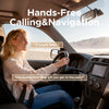 A woman is driving a car and using hands-free calling and navigation features.