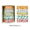 A set of five rolls of floral decorative washi tape in various patterns and colors displayed in a white box.