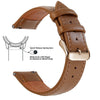 A brown genuine leather watch band featuring quick release spring bars and a slide lever for easy strap attachment.