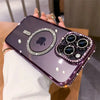 A hand holds a purple glitter diamond magnetic wireless phone case with a clear back and a section of decorative lenses.