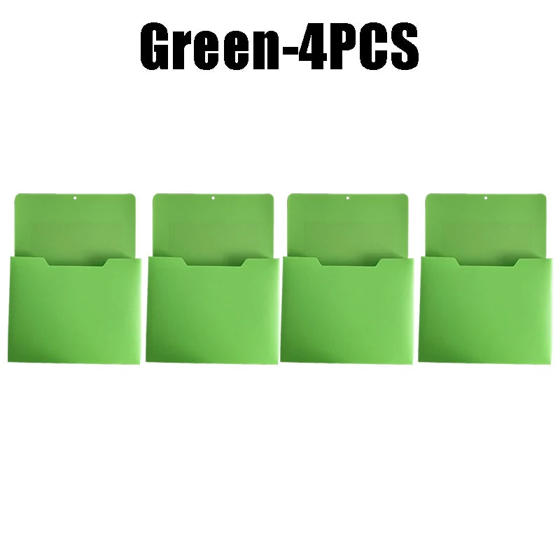 Four green wall mount magnetic document file holders.