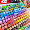 A large collection of vibrant acrylic art markers in various colors arranged in rows.