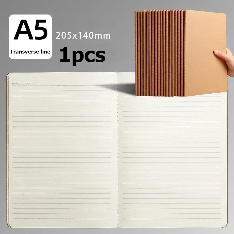 A5 notebook with a kraft paper cover featuring a transverse line, shown open to display the lined pages.