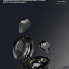 A set of black mini wireless Bluetooth earbuds and a charging box are shown on a dark surface.