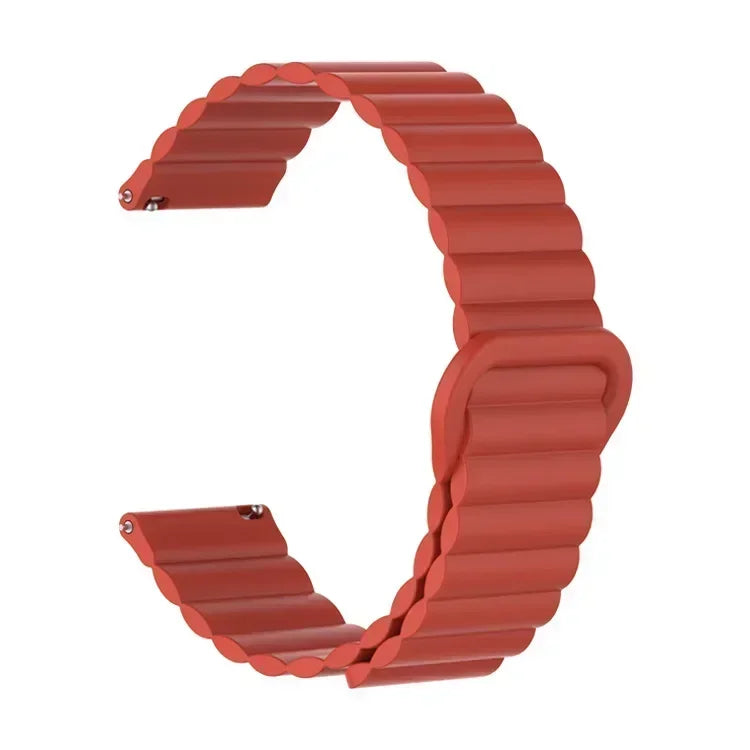 A close-up view of a reddish-brown adjustable magnetic loop watch band.