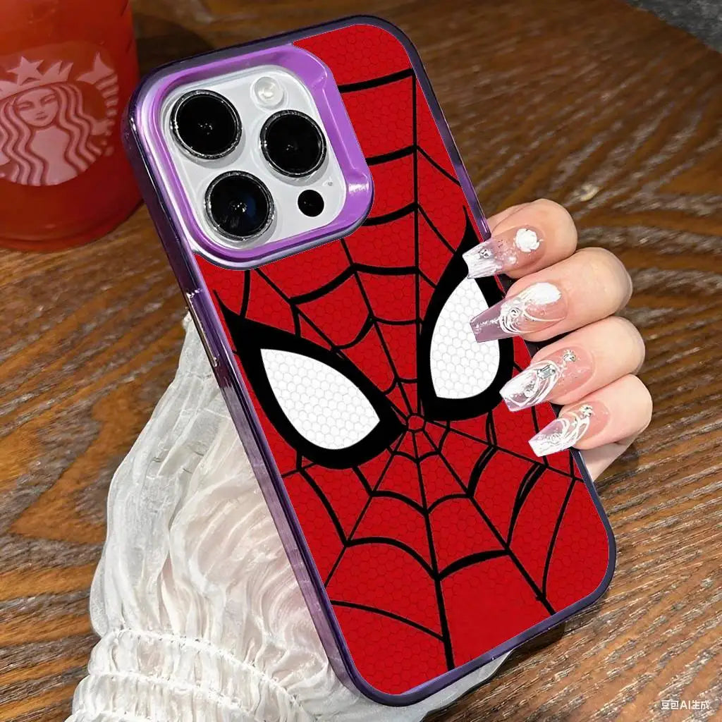 A close-up of an iPhone case featuring a red and black Spider-Man mask design with a clear back, held by a hand.