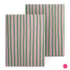 A close-up of a pink and green striped folio cover for an e-reader.
