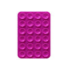 Sujetador de teléfono de silicona rosa con múltiples orificios circulares para montar dispositivos.