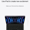 A black Magic Keyboard cover for an iPad, showing the keyboard and the illuminated screen display.