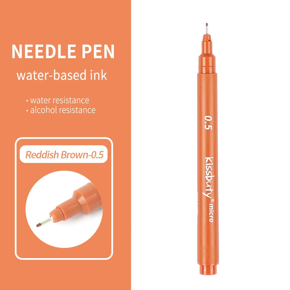 An orange needle pen with a reddish brown ink cartridge and a gold tip.