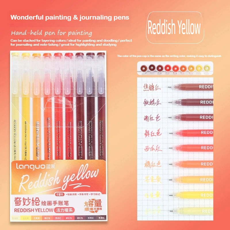 A set of hand-held painting and journaling pens in reddish yellow colors displayed against a white background.