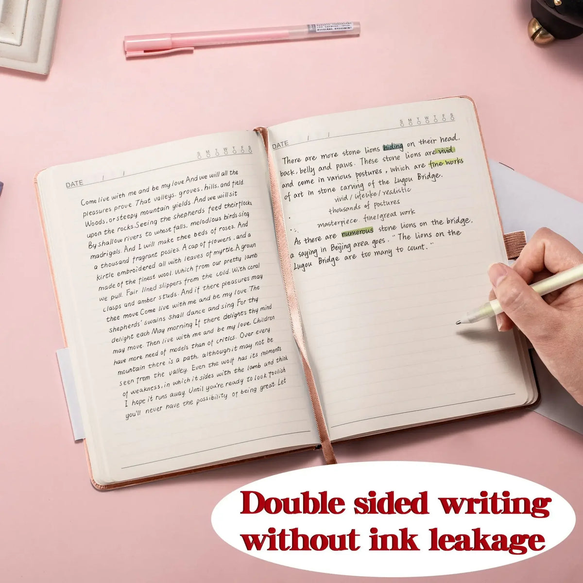 An open premium PU leather A5/A6 journal notebook with handwritten text and a pen on a pink background.