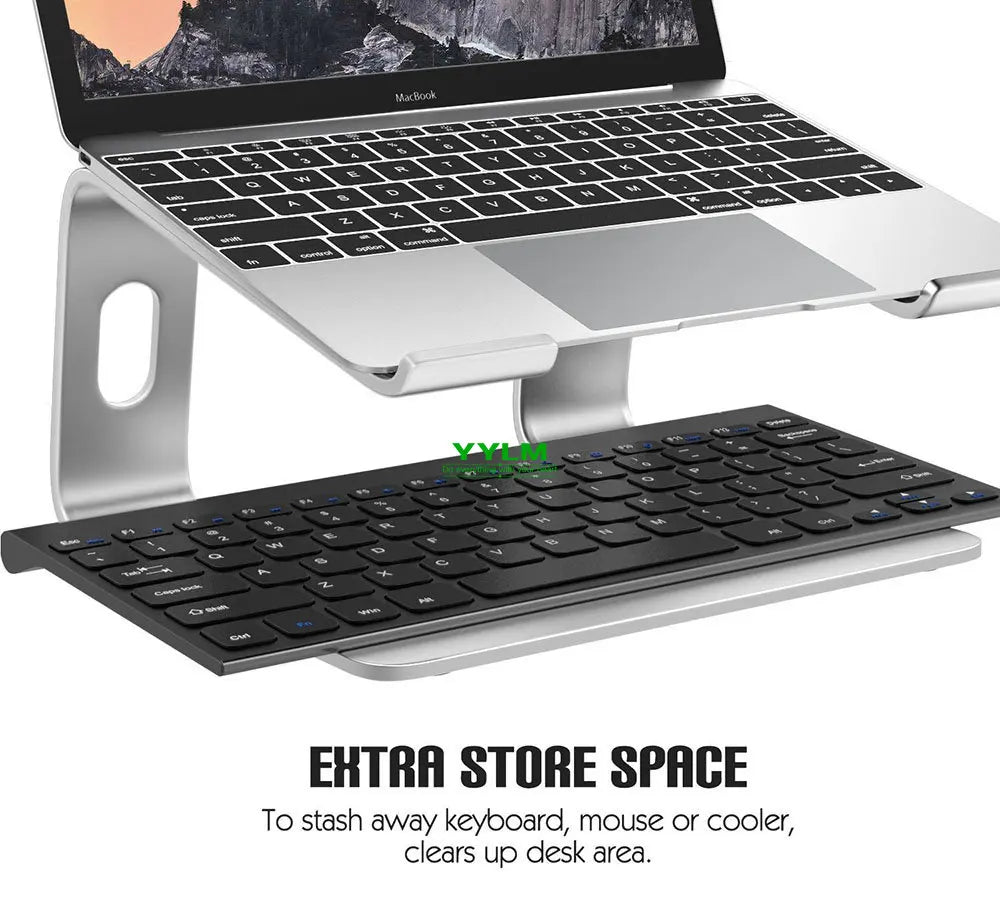 Aluminum alloy laptop stand holding a MacBook and an extra keyboard for desk organization