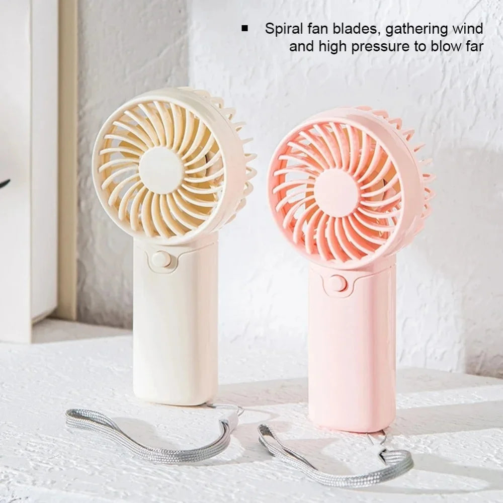 A pair of portable rechargeable mini handheld fans, one white and one pink, are shown with their blades visible.