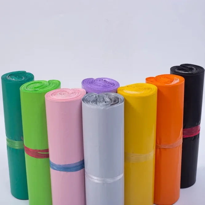 A collection of colorful self-adhesive sealing storage bags in various shades including green, pink, white, yellow, orange, a