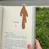 A page from a book features the word Inspiration and a silhouette of a hand.