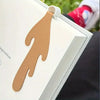 A light brown hand-shaped bookmark attached to a white card, used for creative coffee cup bookmarks.