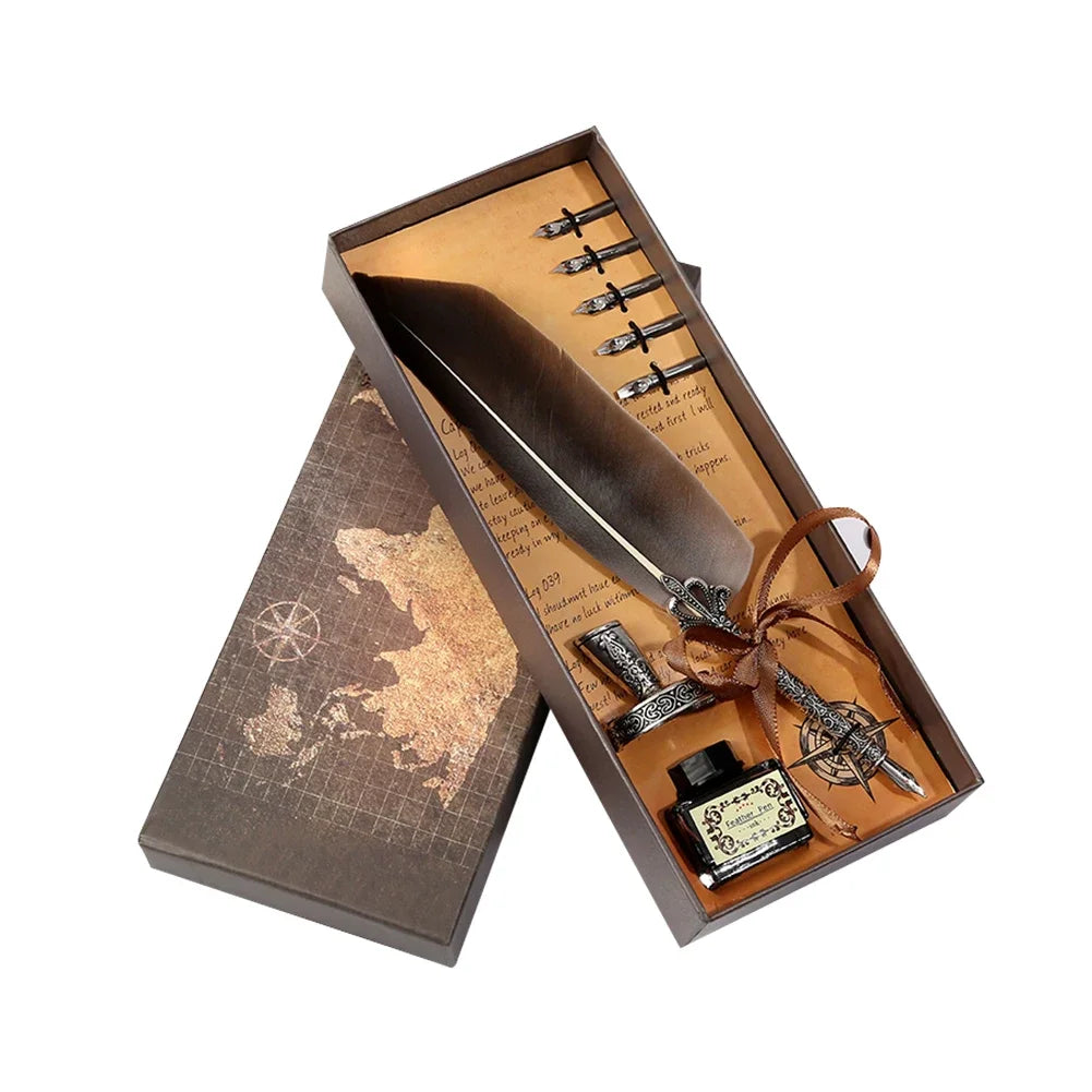 A wooden box containing a feather dip pen set with several pens and an engraved compass.