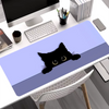 A black cat silhouette is printed on a purple mouse pad placed on a white desk.