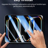 A hand is pressing a tempered glass screen protector onto an iPad screen, demonstrating the easy installation process.