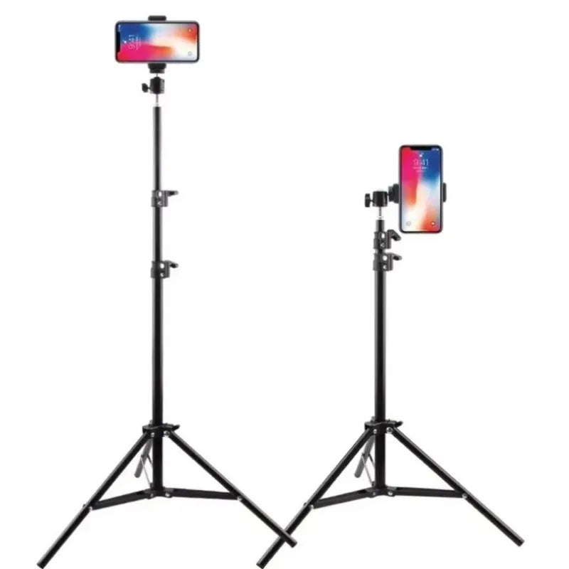 Black adjustable phone tripod with a smartphone mounted for video and selfie