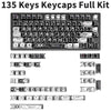 A full kit of 135 comic-style PBT keycaps in black and white featuring various function keys and modifiers.