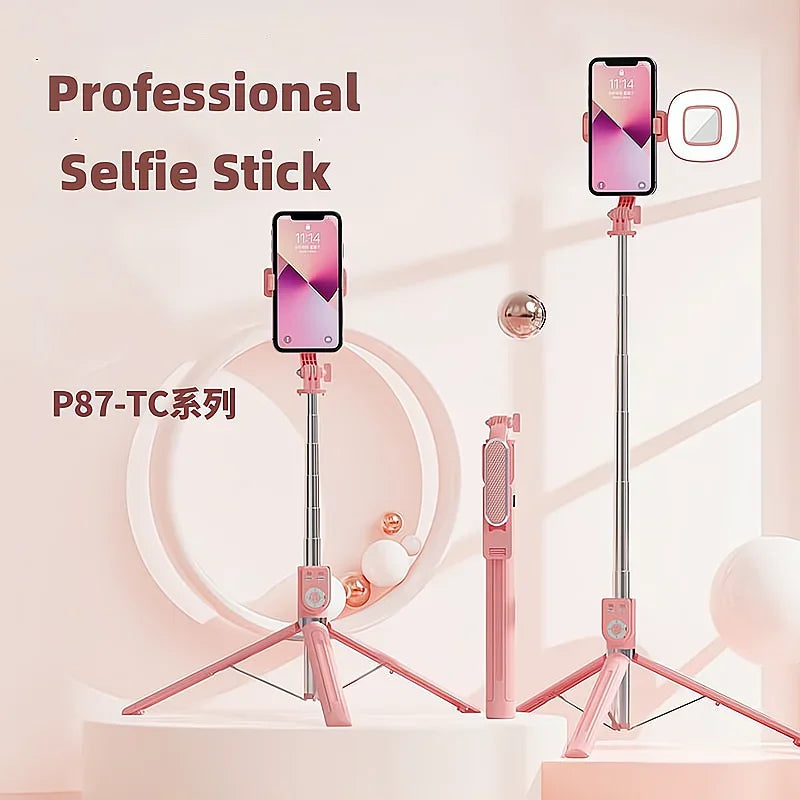 A professional selfie stick in pink and silver is displayed with a smartphone attached, showing its rotating features.