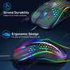 A black honeycomb gaming mouse with colorful RGB lighting is shown on a dark surface.