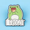 An enamel pin featuring a cartoon frog with an open mouth and a surprised expression.