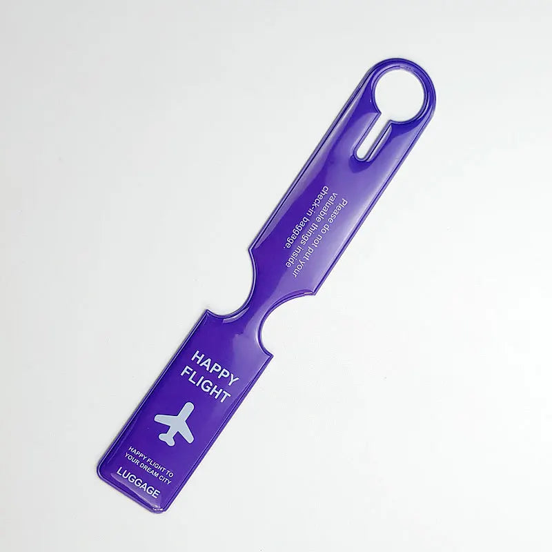 A purple durable PVC luggage tag with a loop for travel identification.