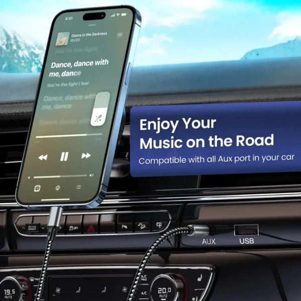 A smartphone is shown connected to an AUX port in a car, demonstrating audio connectivity.