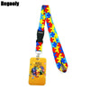 Bfarbiger, gemusterter Lanyard mit einem gelben Schlüsselring.