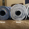 Rolls of extra large rubber desk mat mousepads showing thicknesses from 2mm to 5mm.