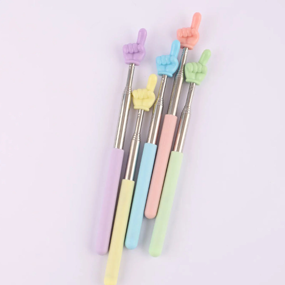 A set of six colorful retractable teacher pointer sticks with various hand shapes and pink, purple, blue, and green colors.